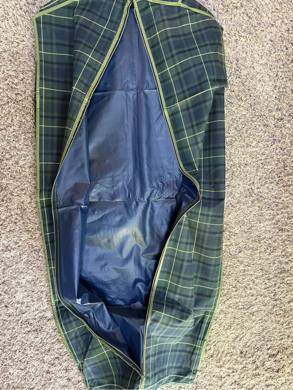 Vintage green/blue tartan plaid vinyl garment bag with zip and folded handles